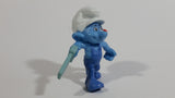 2011 Peyo "Carpenter" Smurf Holding a Saw with a Pencil in His Ear PVC Toy Figure McDonald's Happy Meal