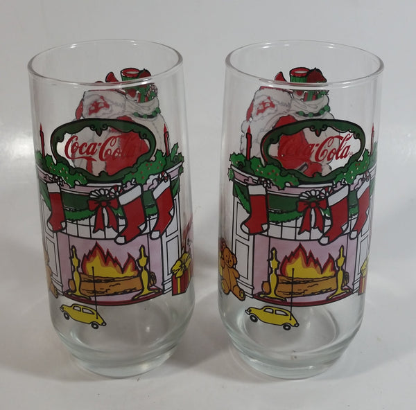 1980s McCrory Stores Inc Set of 2 Coca-Cola Santa Claus Fireplace with Stockings and Toys Christmas Holiday Themed 6" Tall Glass Cup
