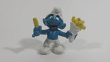 Vintage 1980 Peyo Smurf Character Holding and Eating French Fries PVC Toy Figure