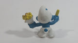Vintage 1980 Peyo Smurf Character Holding and Eating French Fries PVC Toy Figure