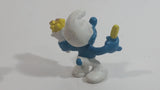 Vintage 1980 Peyo Smurf Character Holding and Eating French Fries PVC Toy Figure