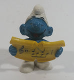 Vintage 1978 Peyo Smurf Character Singing and Holding Music Sheet PVC Toy Figure