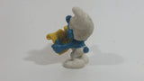 Vintage 1978 Peyo Smurf Character Singing and Holding Music Sheet PVC Toy Figure