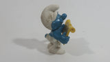 Vintage 1978 Peyo Smurf Character Singing and Holding Music Sheet PVC Toy Figure