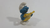 Vintage 1978 Peyo Smurf Character Singing and Holding Music Sheet PVC Toy Figure