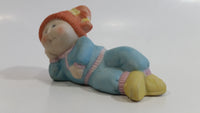 1984 OAA Cabbage Patch Kids Orange Hair Girl in Light Blue Laying Ceramic Figurine
