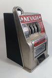 Vintage Nevada Las Vegas "Entertainment Capital of the World" 11" Tall Metal Coin Bank 4 Wheel