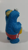 Applause Muppets Sesame Street Cookie Monster Character In Beach Shorts with a Pail of Shells Holding a Conch Shell To His Ear 3" Tall Hard Rubber PVC Toy