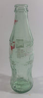 December 1993 Coca-Cola Classic Commemorative Santa Claus Christmas Themed 7 1/2" Tall 8 Fl oz. 237mL Glass Soda Pop Bottle