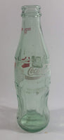 December 1993 Coca-Cola Classic Commemorative Santa Claus Christmas Themed 7 1/2" Tall 8 Fl oz. 237mL Glass Soda Pop Bottle