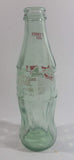 December 1993 Coca-Cola Classic Commemorative Santa Claus Christmas Themed 7 1/2" Tall 8 Fl oz. 237mL Glass Soda Pop Bottle