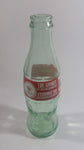 1999 Coca-Cola Classic '99 Winnipeg Pan American Games "The Spirit of Refreshment" 7 1/2" Tall 8 Fl oz. 237mL Glass Soda Pop Bottle