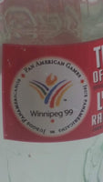 1999 Coca-Cola Classic '99 Winnipeg Pan American Games "The Spirit of Refreshment" 7 1/2" Tall 8 Fl oz. 237mL Glass Soda Pop Bottle