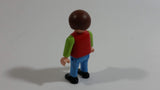 1995 Geobra Playmobil Brown Haired Boy Blue Pants Red Top Green Sleeves 2" Tall Toy Figure