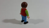 1995 Geobra Playmobil Brown Haired Boy Blue Pants Red Top Green Sleeves 2" Tall Toy Figure