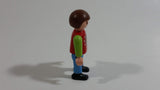 1995 Geobra Playmobil Brown Haired Boy Blue Pants Red Top Green Sleeves 2" Tall Toy Figure