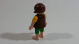 Geobra Playmobil Brown Haired Girl Green Shorts Brown Top Yellow Sleeves 2" Tall Toy Figure