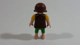 Geobra Playmobil Brown Haired Girl Green Shorts Brown Top Yellow Sleeves 2" Tall Toy Figure
