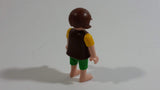 Geobra Playmobil Brown Haired Girl Green Shorts Brown Top Yellow Sleeves 2" Tall Toy Figure