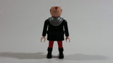 1993 Geobra Playmobil No Hair Knight in Red Bottoms Black Top with Silver Dots and collar  3" Tall Toy Figure Wearing a Holster