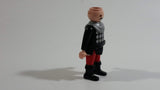 1993 Geobra Playmobil No Hair Knight in Red Bottoms Black Top with Silver Dots and collar  3" Tall Toy Figure Wearing a Holster