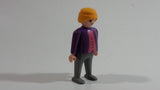 Vintage 1986 Geobra Playmobil Blonde Haired Girl Woman Grey Bottoms Purple and Pink Top 3" Tall Toy Figure