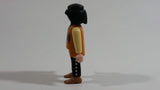 1994 Geobra Playmobil Black Haired Pirate Man Black Bottoms Tan Orange Top White Sleeves Stubble and Eye patch 3" Tall Toy Figure