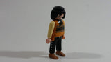 1994 Geobra Playmobil Black Haired Pirate Man Black Bottoms Tan Orange Top White Sleeves Stubble and Eye patch 3" Tall Toy Figure