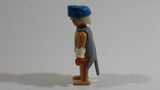 Vintage 1974 Geobra Playmobil White Haired Native American Indian Man Brown Bottoms Brown Top with White Cuffs, Grey Hide Cape, Blue Hat 3" Tall Toy Figure