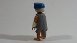 Vintage 1974 Geobra Playmobil White Haired Native American Indian Man Brown Bottoms Brown Top with White Cuffs, Grey Hide Cape, Blue Hat 3" Tall Toy Figure