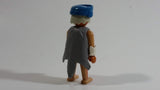 Vintage 1974 Geobra Playmobil White Haired Native American Indian Man Brown Bottoms Brown Top with White Cuffs, Grey Hide Cape, Blue Hat 3" Tall Toy Figure
