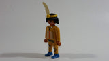 1993 Geobra Playmobil Black Haired Native American Indian Man Yellow Bottoms Yellow Top with Yellow Band with White Feather 3" Tall Toy Figure