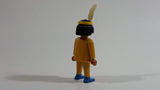 1993 Geobra Playmobil Black Haired Native American Indian Man Yellow Bottoms Yellow Top with Yellow Band with White Feather 3" Tall Toy Figure