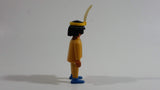 1993 Geobra Playmobil Black Haired Native American Indian Man Yellow Bottoms Yellow Top with Yellow Band with White Feather 3" Tall Toy Figure
