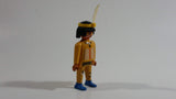 1993 Geobra Playmobil Black Haired Native American Indian Man Yellow Bottoms Yellow Top with Yellow Band with White Feather 3" Tall Toy Figure