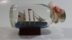 Vintage Highly Detailed Miniature German Flagged Tall Ship in Cork Top 4 1/4" Long Glass Bottle