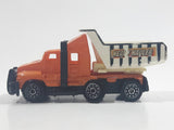 Unknown Brand "Heavy Hauler" Gravel Truck Orange and White Die Cast Toy Car Vehicle