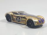 2009 Hot Wheels Track Stars Covelight Gold Chrome #09 Die Cast Toy Car Vehicle