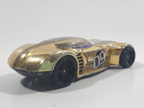 2009 Hot Wheels Track Stars Covelight Gold Chrome #09 Die Cast Toy Car Vehicle