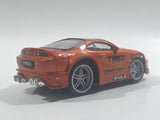 2003 Kentoys Extreme Tuners Toyota Supra Orange 1/55 Scale Light Up Die Cast Toy Car Vehicle with Rubber Tires - Missing The Spoiler