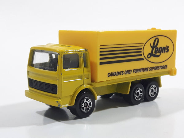Majorette Leon's Canada's Only Furniture Superstores Semi Truck Yellow 1/100 Scale Die Cast Toy Car Vehicle with Opening Rear Doors