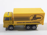 Majorette Leon's Canada's Only Furniture Superstores Semi Truck Yellow 1/100 Scale Die Cast Toy Car Vehicle with Opening Rear Doors