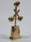 My's Railroad Crossing 4 1/2" Tall Gold Tone Metal Miniature Quartz Clock - Needs A Battery