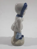 Vintage Blue and White Delft Style Girl Holding Puppy Porcelain Figure 3 3/4" Tall