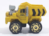 1987 Road Champs Dump Truck Yellow Micro Mini Die Cast Toy Car Construction Vehicle