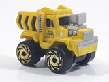 1987 Road Champs Dump Truck Yellow Micro Mini Die Cast Toy Car Construction Vehicle