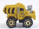 1987 Road Champs Dump Truck Yellow Micro Mini Die Cast Toy Car Construction Vehicle