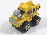 1987 Road Champs Dump Truck Yellow Micro Mini Die Cast Toy Car Construction Vehicle