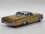 Disney Pixar Cars Cadillac Coupe de Ville Gold with Brown and White Cow Print Roof Die Cast Toy Car Vehicle