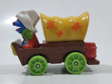 1987 Playskool Muppets Sesame Street Cowboy Grover Chuck Wagon Yellow and Brown Die Cast Toy Car Vehicle
